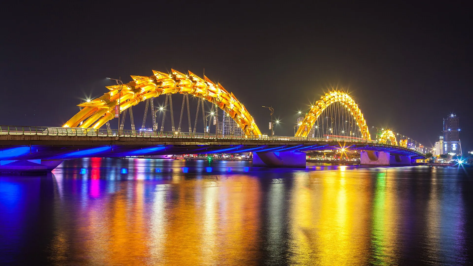 Dragon Bridge lit up over the Han River at night